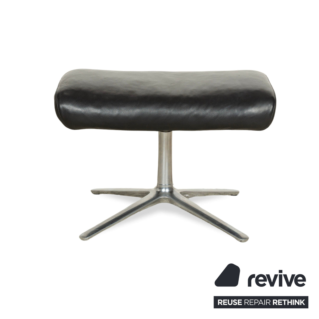 Fauteuil en cuir Cor Cordia noir à fonction manuelle avec tabouret
