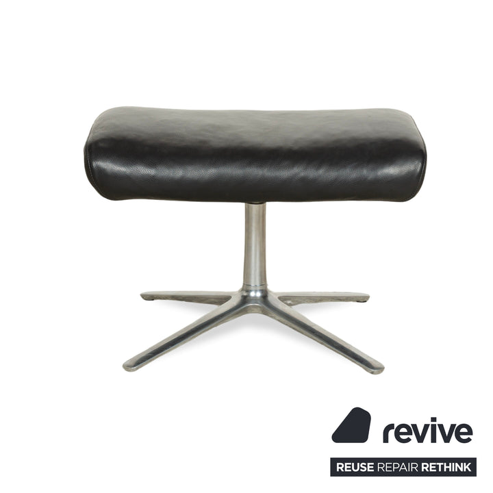 Fauteuil en cuir Cor Cordia noir à fonction manuelle avec tabouret