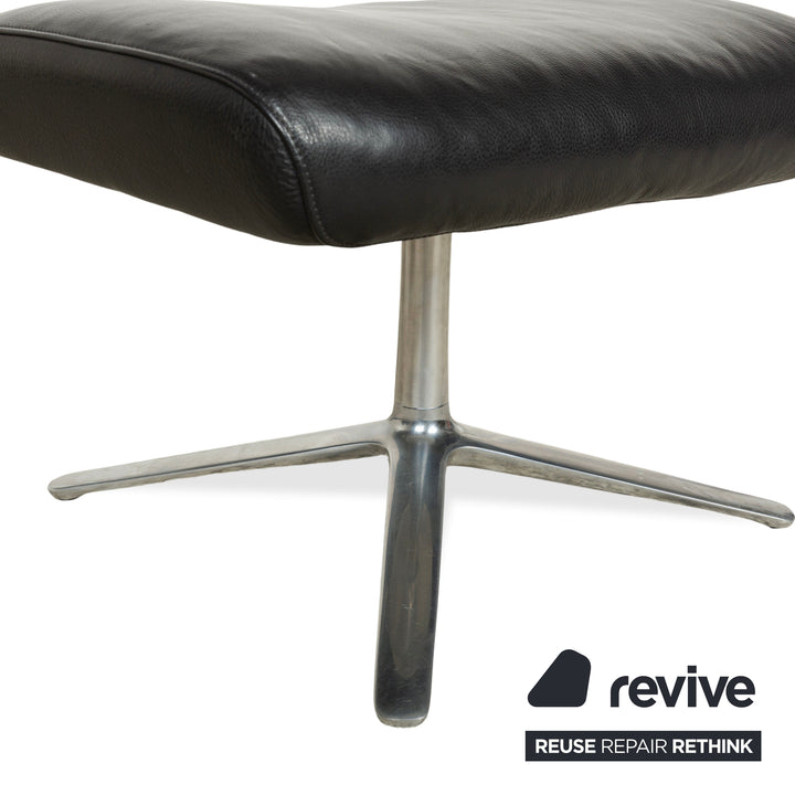 Fauteuil en cuir Cor Cordia noir à fonction manuelle avec tabouret