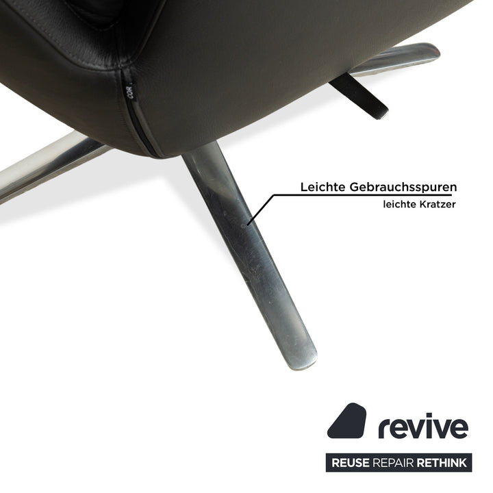 Fauteuil en cuir Cor Cordia noir à fonction manuelle avec tabouret