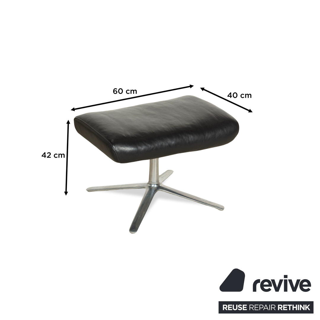 Fauteuil en cuir Cor Cordia noir à fonction manuelle avec tabouret