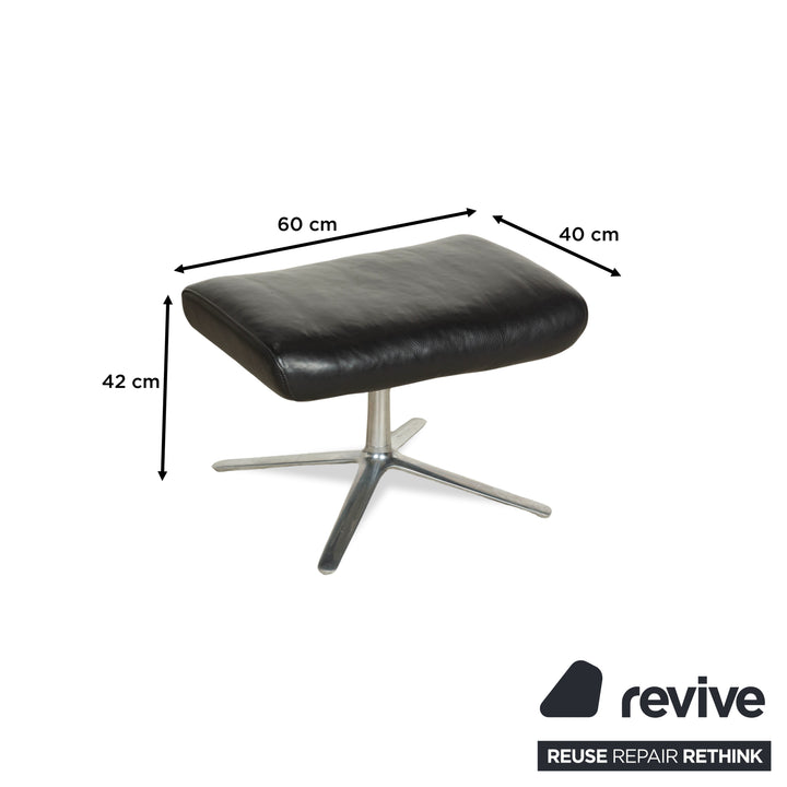 Fauteuil en cuir Cor Cordia noir à fonction manuelle avec tabouret