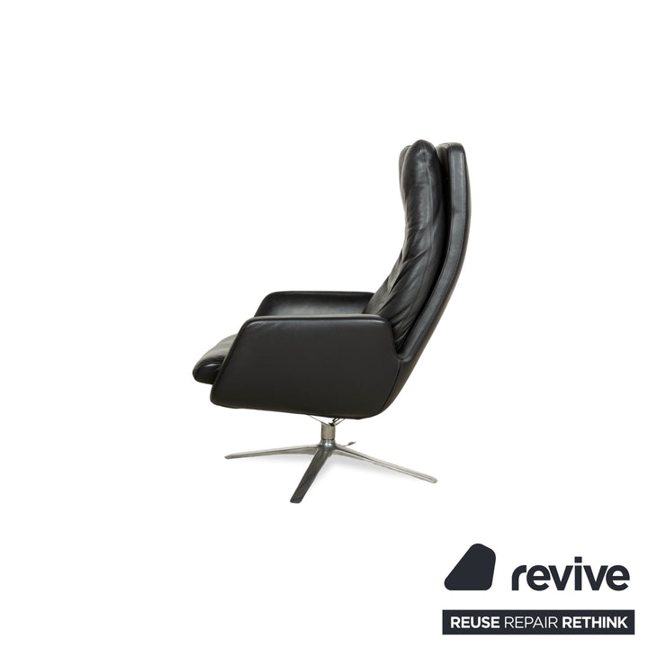Fauteuil en cuir Cor Cordia noir à fonction manuelle avec tabouret