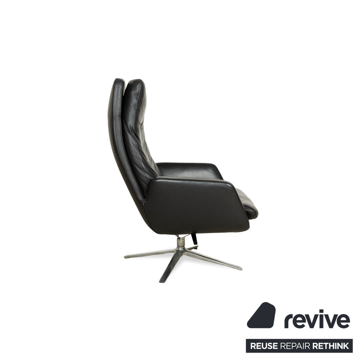 Fauteuil en cuir Cor Cordia noir à fonction manuelle avec tabouret
