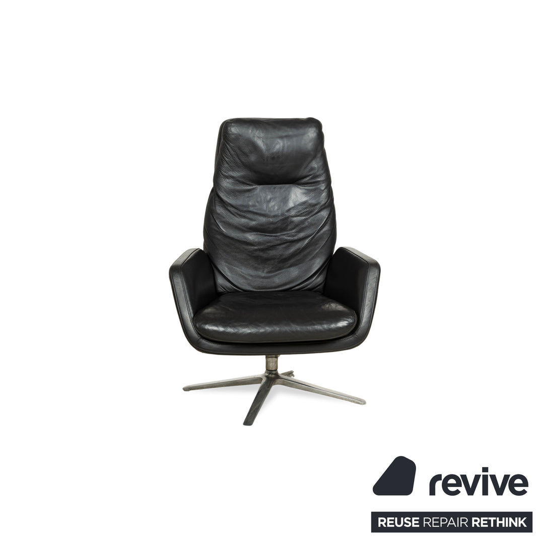 Fauteuil en cuir Cor Cordia noir à fonction manuelle avec tabouret