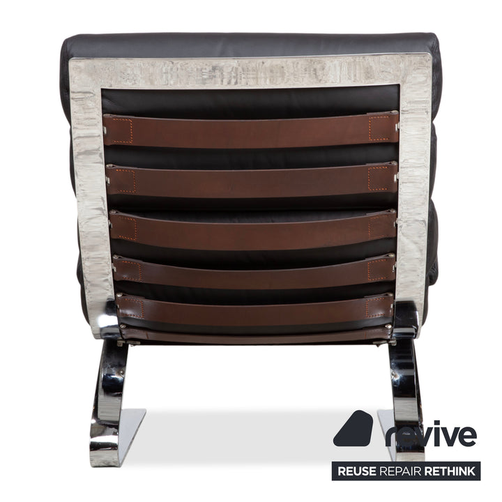 Cor Sinus Leder Chrom Sessel Schwarz inkl. Hocker Freischwinger Neubezug