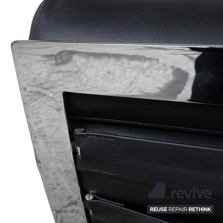 Cor Sinus Leder Chrom Sessel Schwarz inkl. Hocker Freischwinger