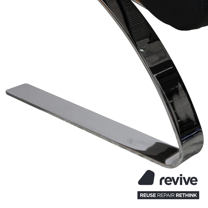 Cor Sinus Leder Chrom Sessel Schwarz inkl. Hocker Freischwinger