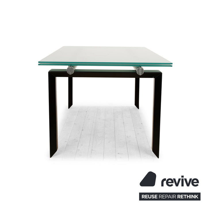 Table à manger extensible en verre sur pilotis Desalto argentée et noire