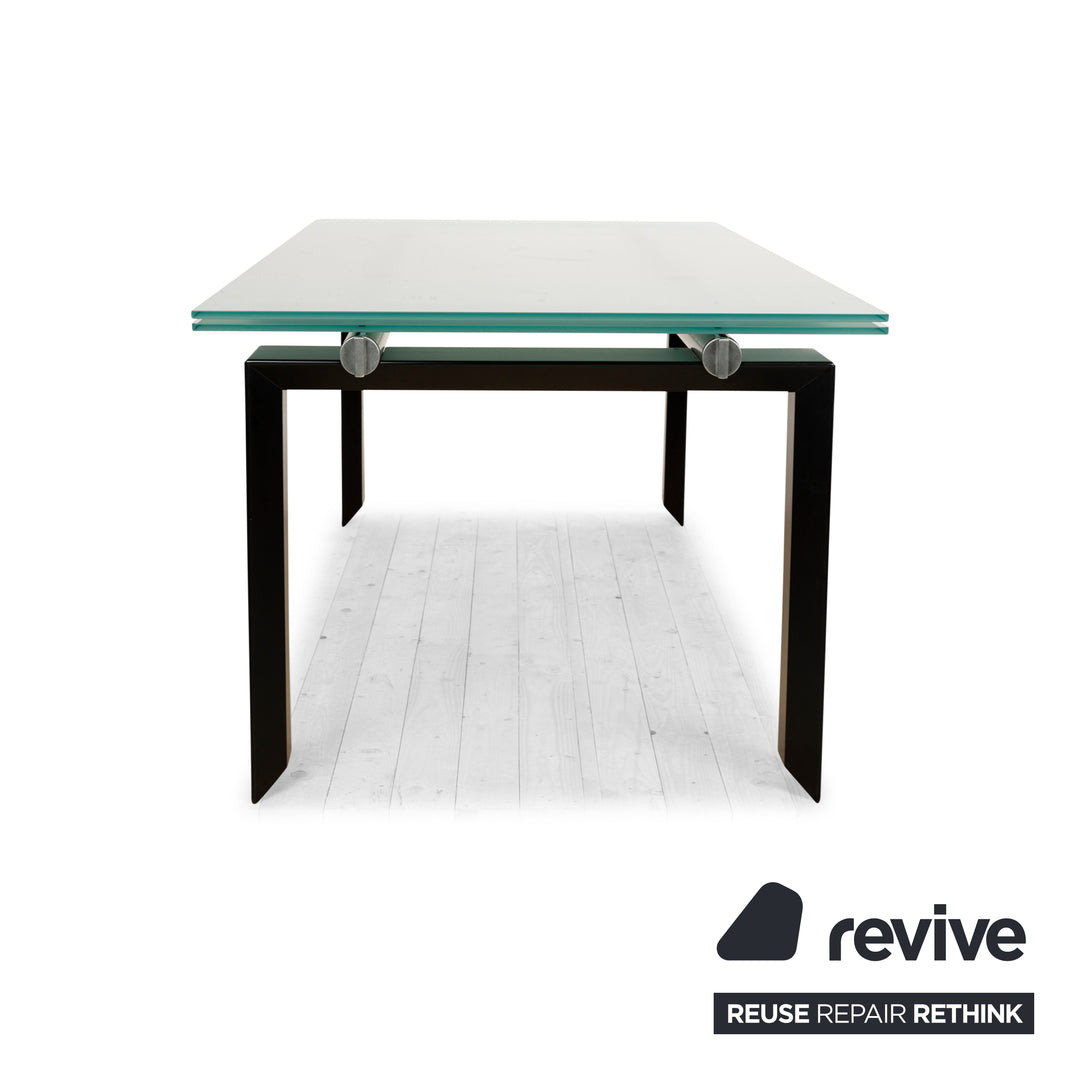 Table à manger extensible en verre sur pilotis Desalto argentée et noire