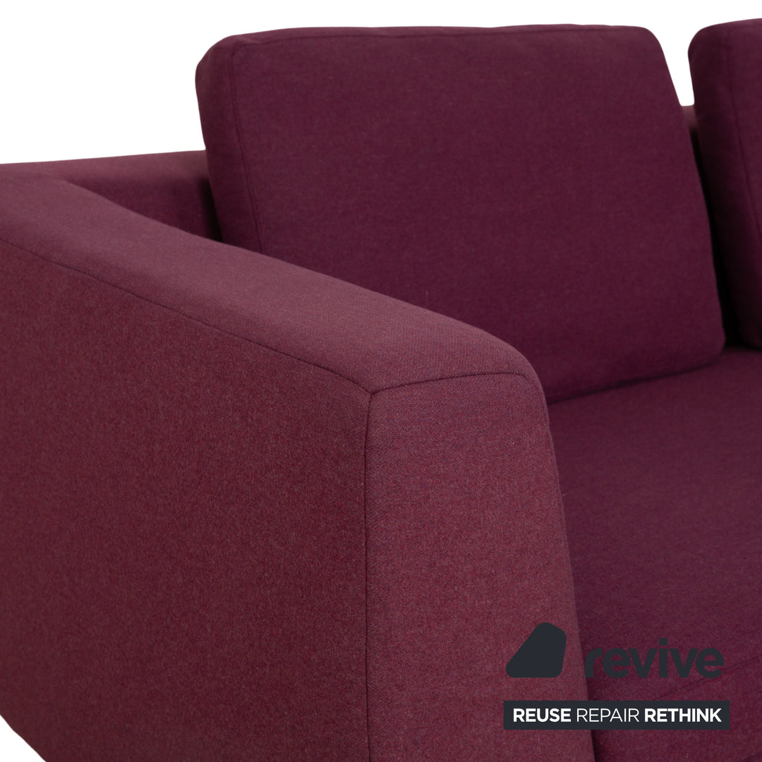 Canapé d'angle en tissu Domino Ewald Schillig violet