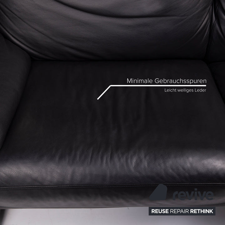 Canapé en cuir noir Ewald Schillig deux places avec fonction manuelle