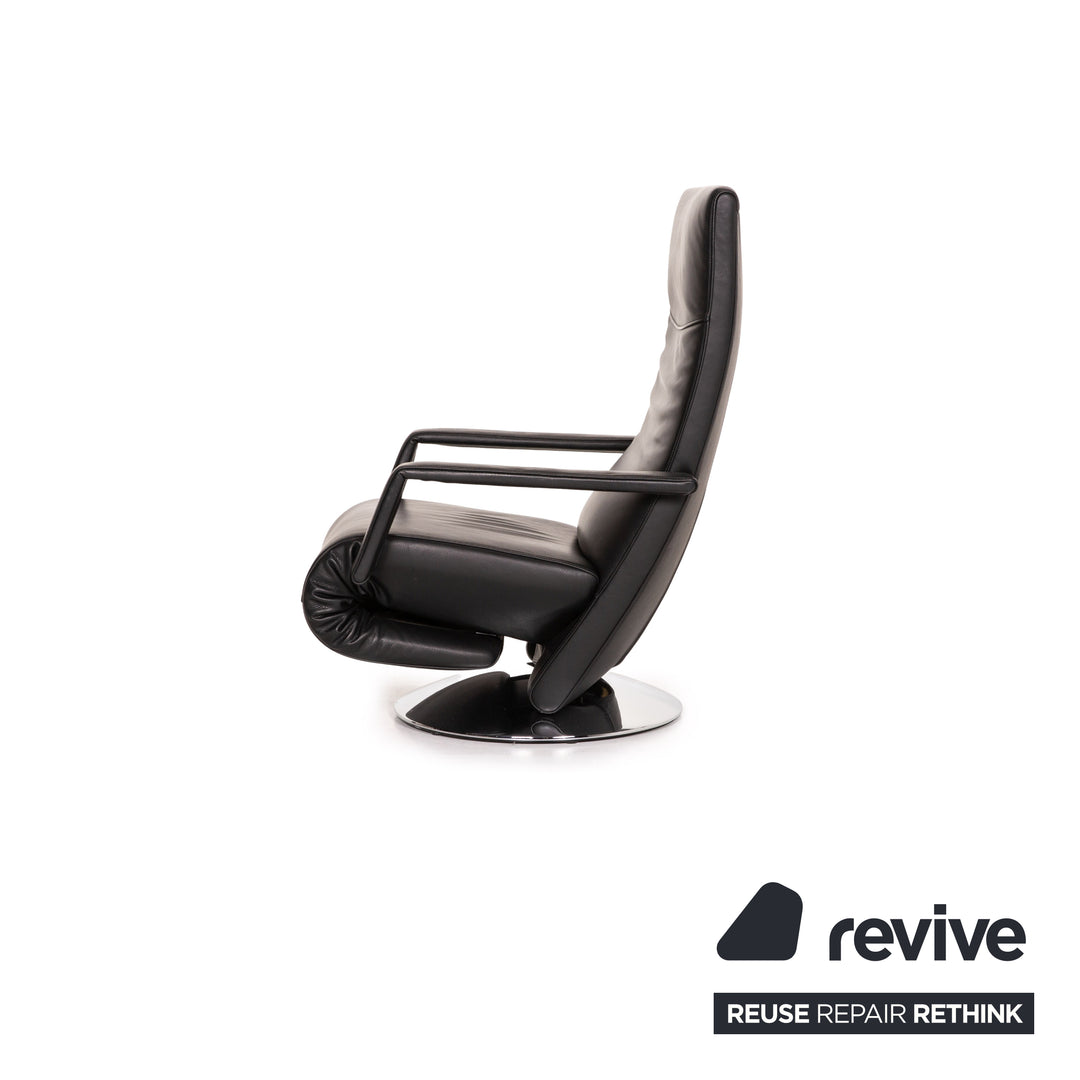 Fauteuil en cuir FSM Evolo noir fonction électrique fonction de relaxation fauteuil de relaxation rotatif