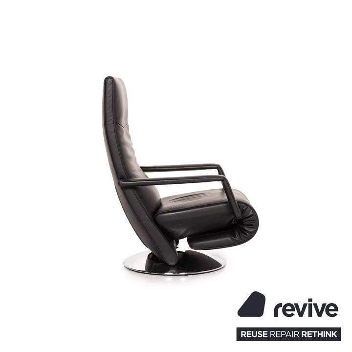 Fauteuil en cuir FSM Evolo noir fonction électrique fonction de relaxation fauteuil de relaxation rotatif