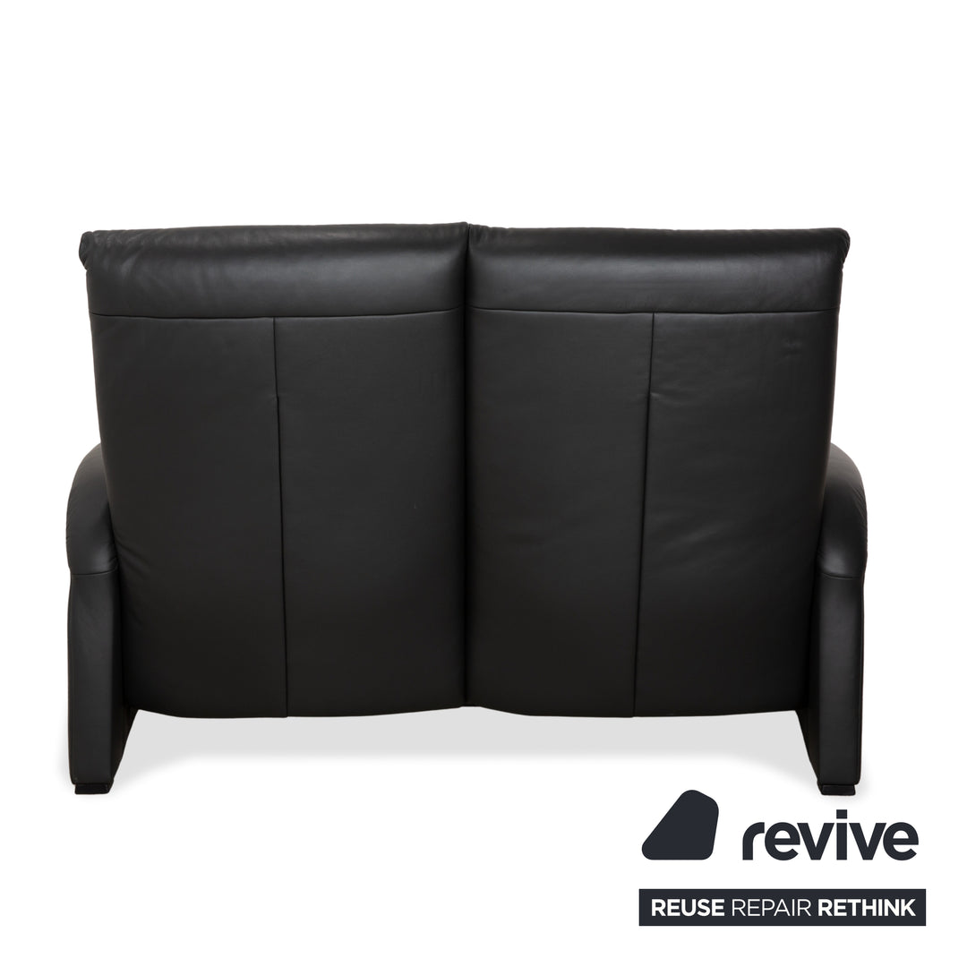 Ensemble de canapés en cuir Himolla 4978 : canapé trois places, canapé deux places et fauteuil, coloris anthracite et gris foncé, à réglage manuel.