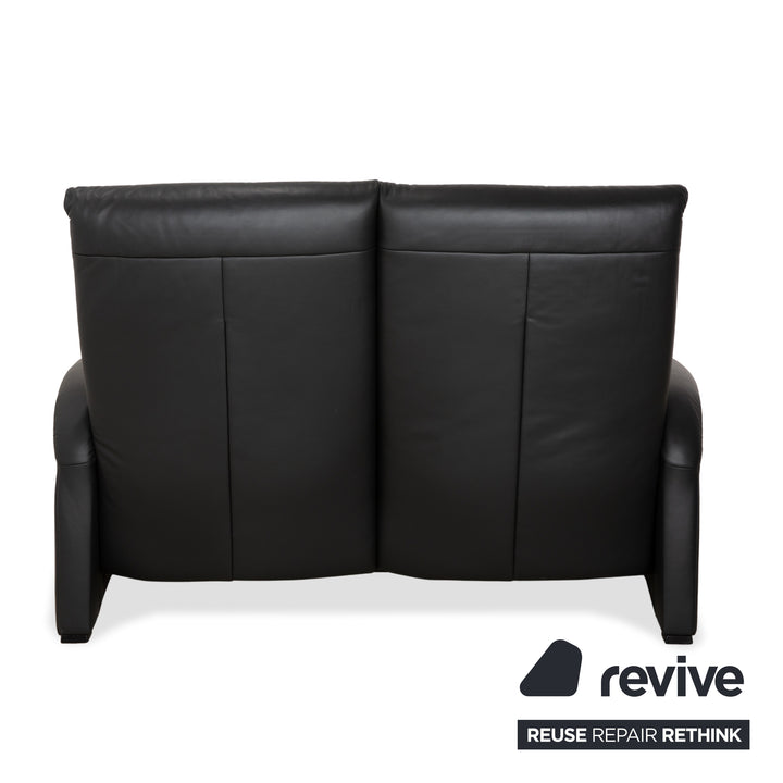 Ensemble de canapés en cuir Himolla 4978 : canapé trois places, canapé deux places et fauteuil, coloris anthracite et gris foncé, à réglage manuel.