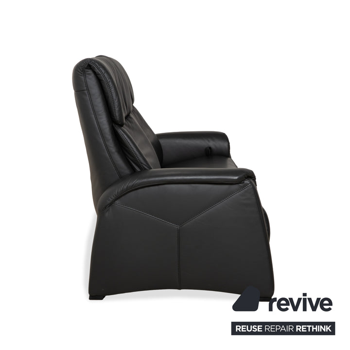 Ensemble de canapés en cuir Himolla 4978 : canapé trois places, canapé deux places et fauteuil, coloris anthracite et gris foncé, à réglage manuel.