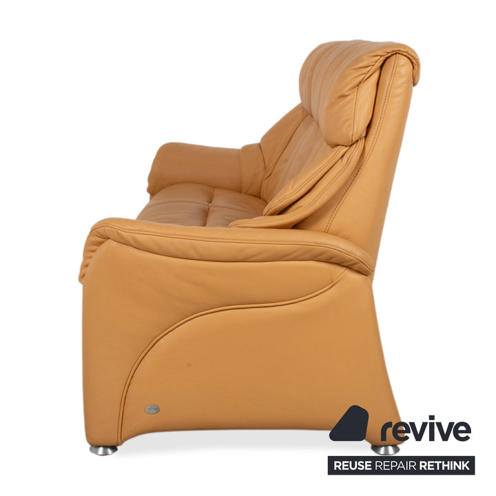 Himolla canapé trois places en cuir cognac orange