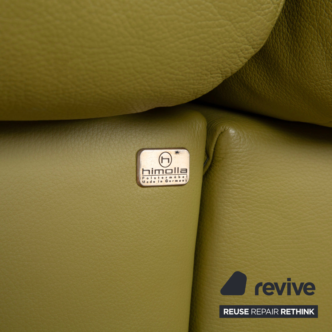 Canapé d'angle en cuir Himolla vert, jaune et vert olive, avec fonctions électriques et manuelles.