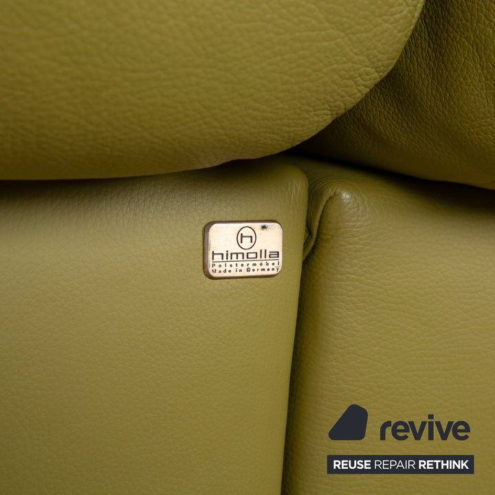 Canapé d'angle en cuir Himolla vert, jaune et vert olive, avec fonctions électriques et manuelles.