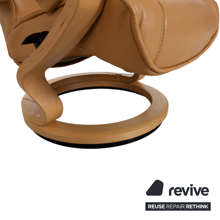 Fauteuil en cuir Himolla marron cognac avec pouf
