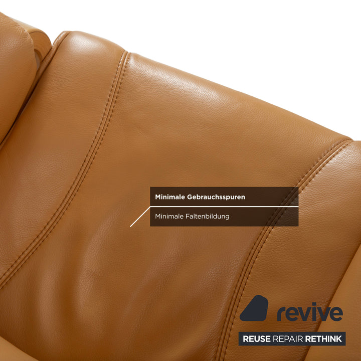 Fauteuil en cuir Himolla marron cognac avec pouf