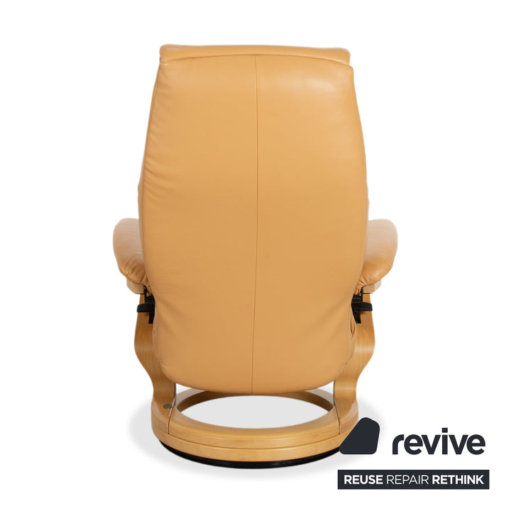 Fauteuil en cuir Himolla marron cognac avec pouf