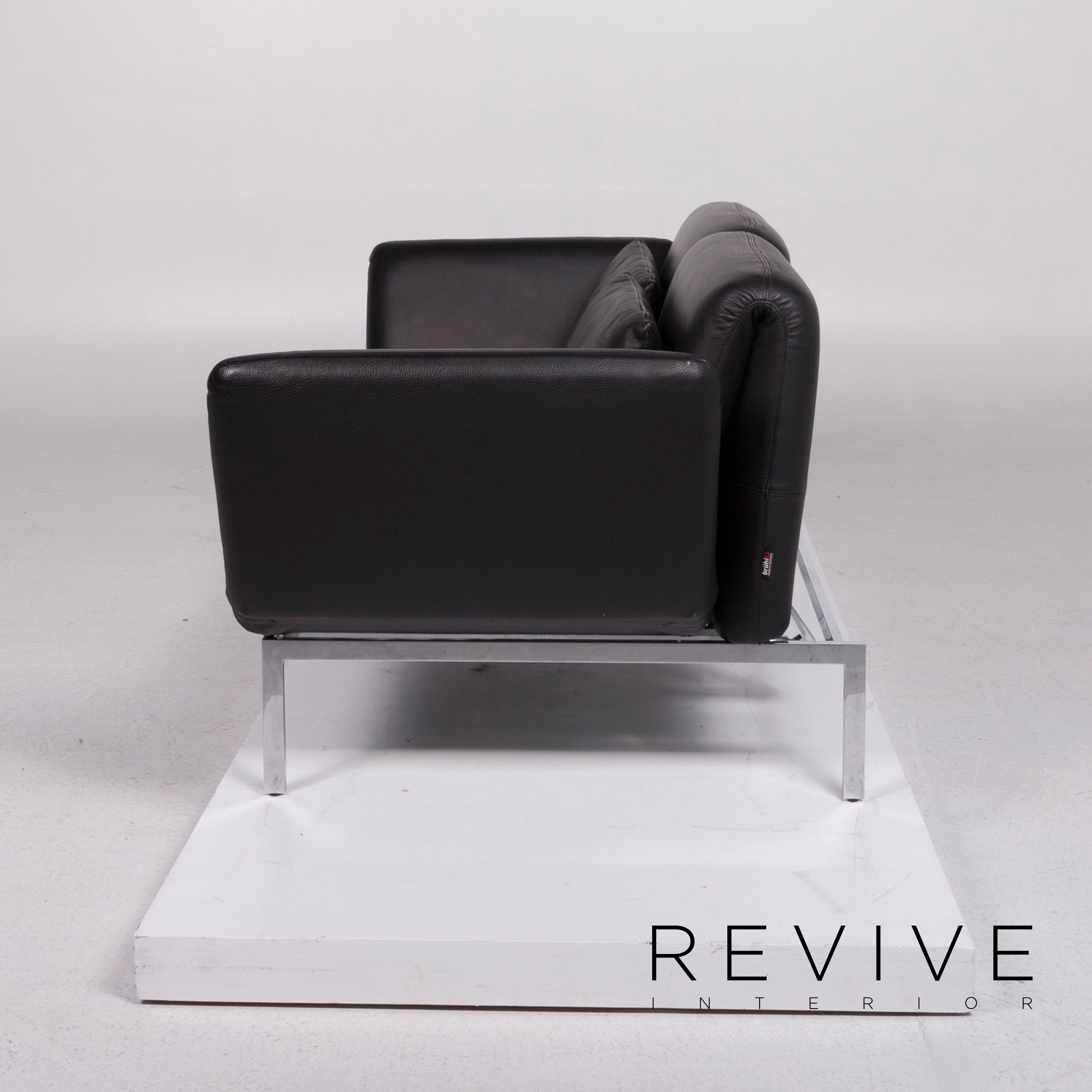 Canapé deux places Brühl Roro Medium en cuir noir avec fonction manuelle