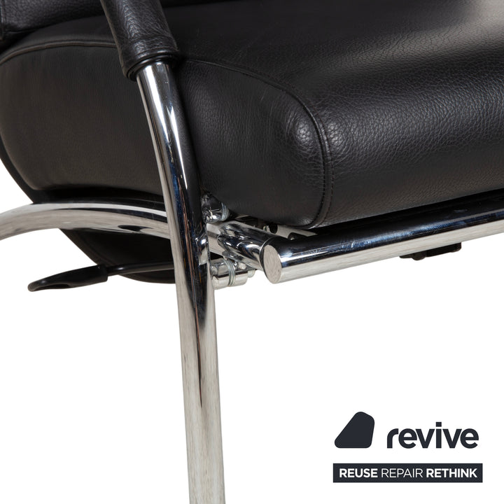 IP Design Curve Leder Sessel Schwarz manuelle Funktion Fußstütze Relaxfunktion Design Prof. Stefan Heiliger