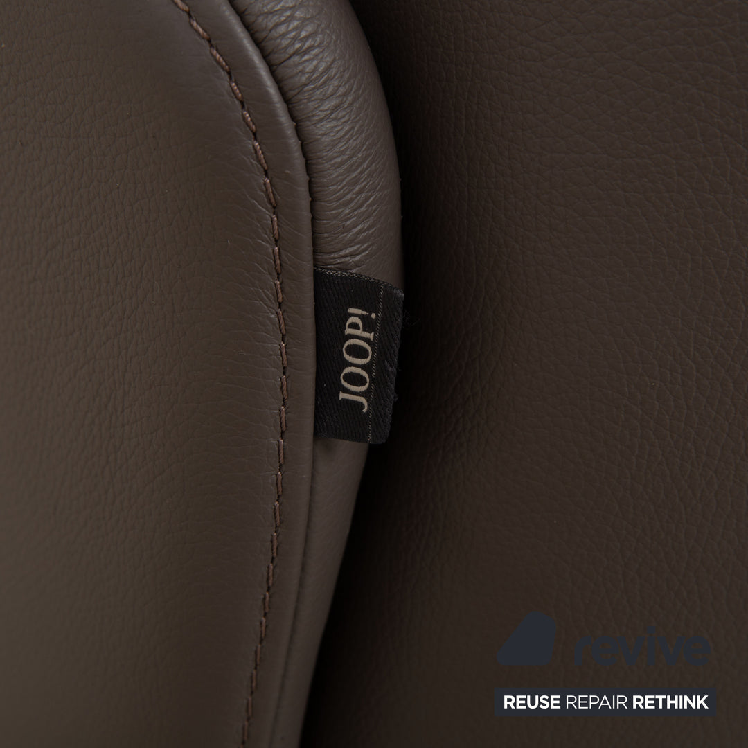 Fauteuil Joop 8115 en cuir gris taupe chromé, à réglage manuel, avec repose-pieds.