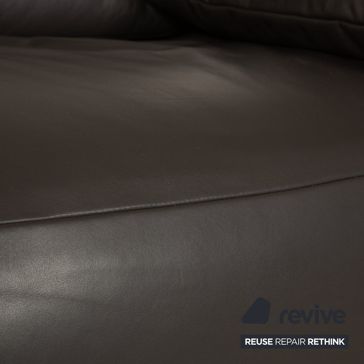 Canapé deux places en cuir gris foncé avec fonction électrique Koinor Free Motion Edit 1