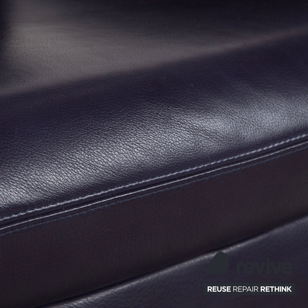 Fauteuil pivotant en cuir Koinor Interio violet aubergine