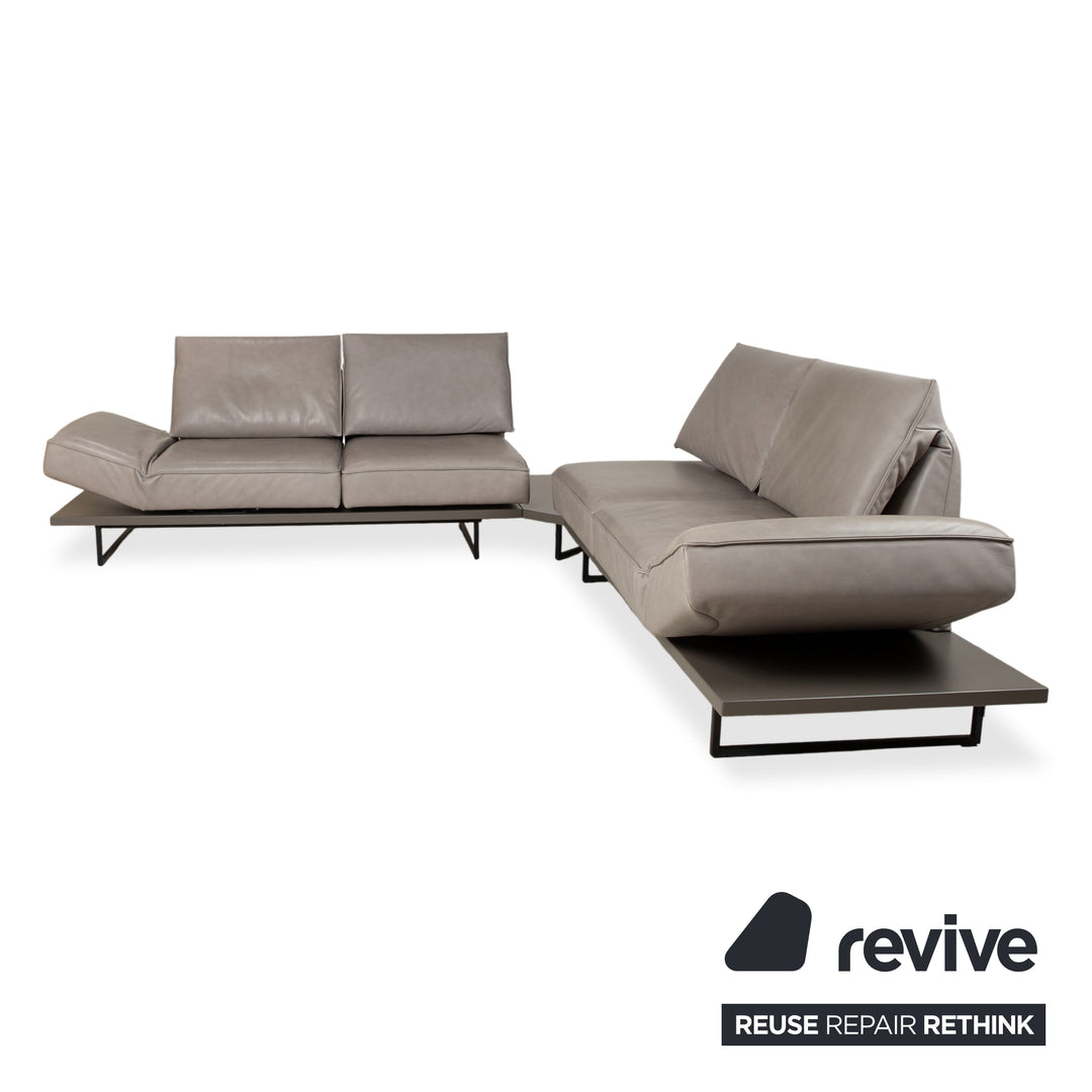Canapé d'angle en cuir Koinor Phoenix gris taupe grège avec fonction manuelle