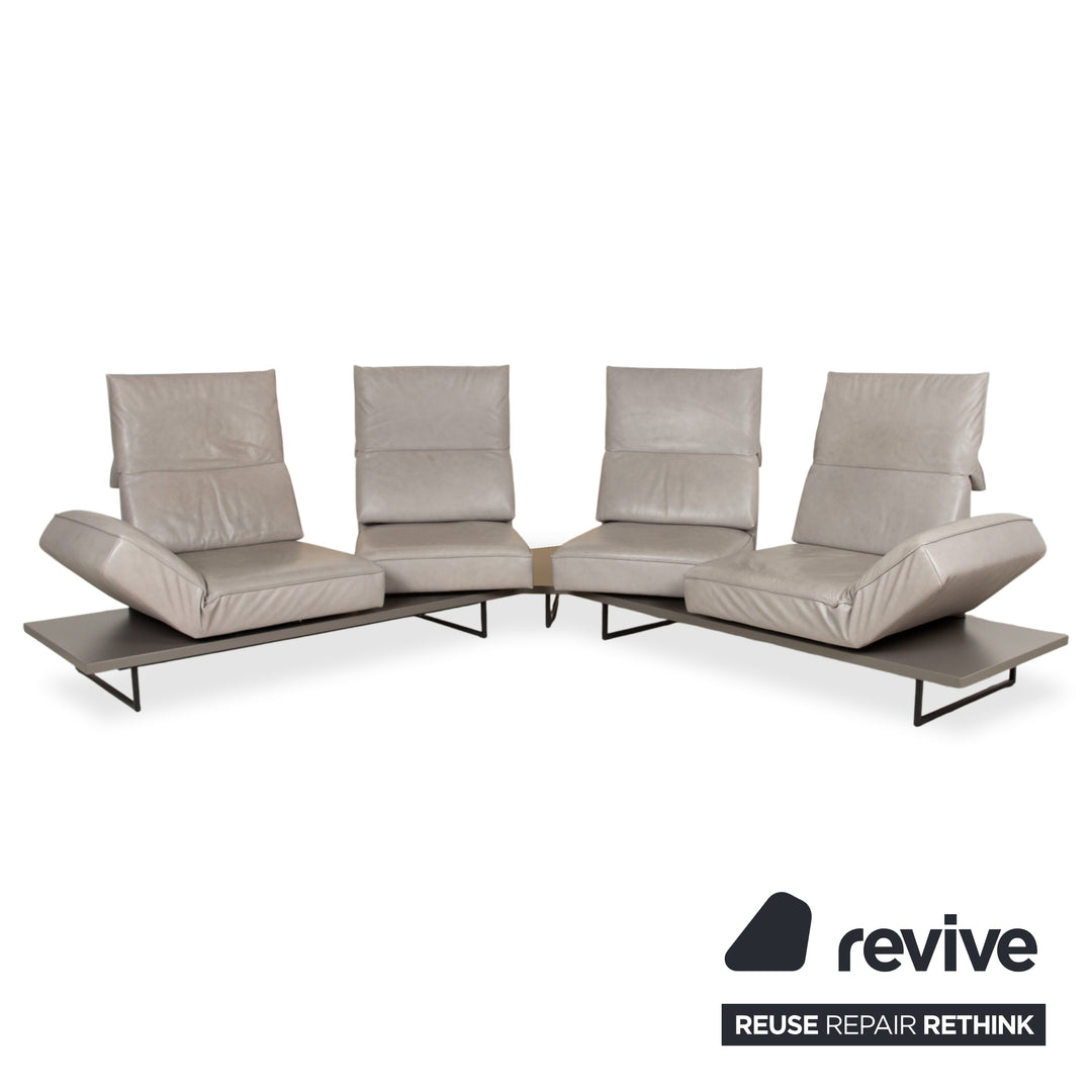 Canapé d'angle en cuir Koinor Phoenix gris taupe grège avec fonction manuelle