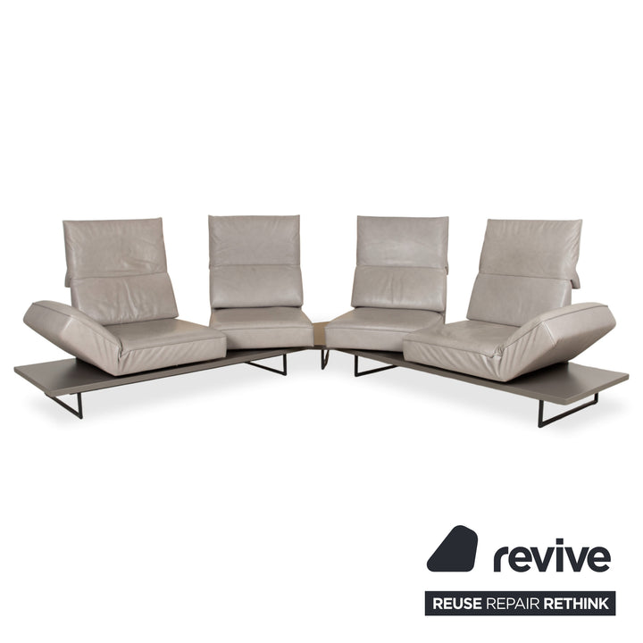 Canapé d'angle en cuir Koinor Phoenix gris taupe grège avec fonction manuelle
