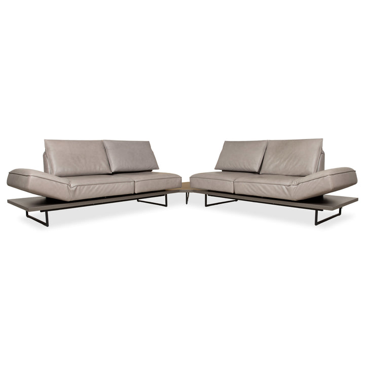 Canapé d'angle en cuir Koinor Phoenix gris taupe grège avec fonction manuelle