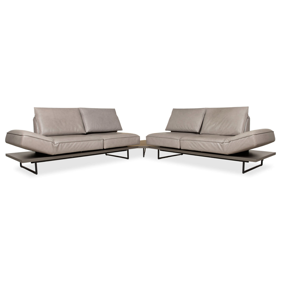 Canapé d'angle en cuir Koinor Phoenix gris taupe grège avec fonction manuelle