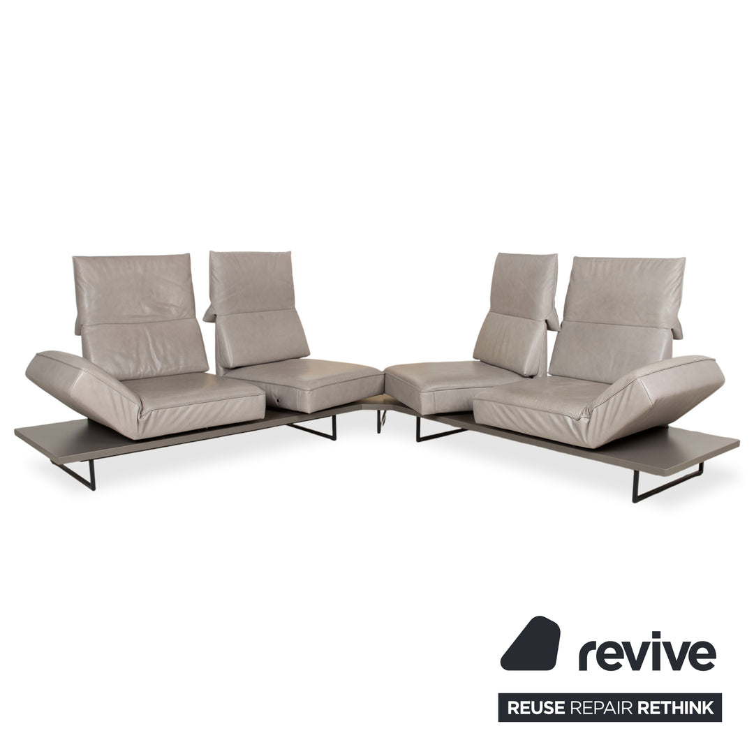 Canapé d'angle en cuir Koinor Phoenix gris taupe grège avec fonction manuelle
