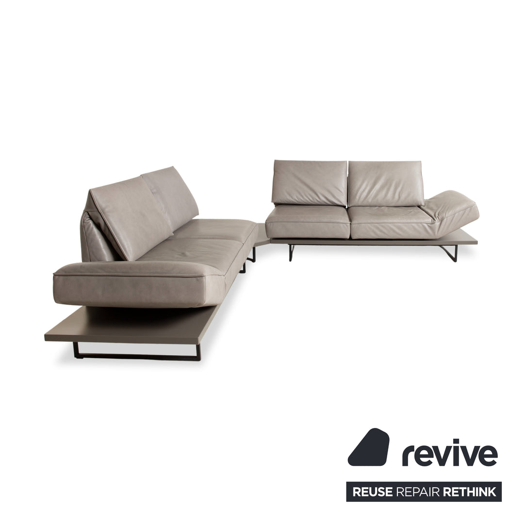 Canapé d'angle en cuir Koinor Phoenix gris taupe grège avec fonction manuelle