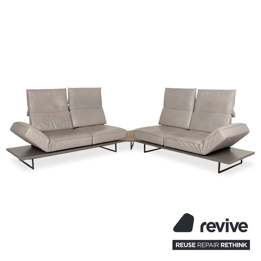 Canapé d'angle en cuir Koinor Phoenix gris taupe grège avec fonction manuelle