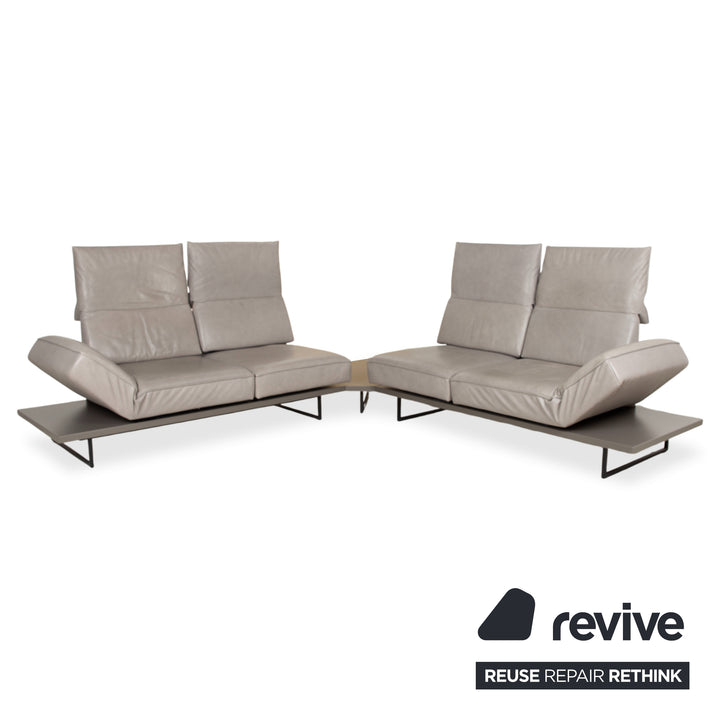 Canapé d'angle en cuir Koinor Phoenix gris taupe grège avec fonction manuelle