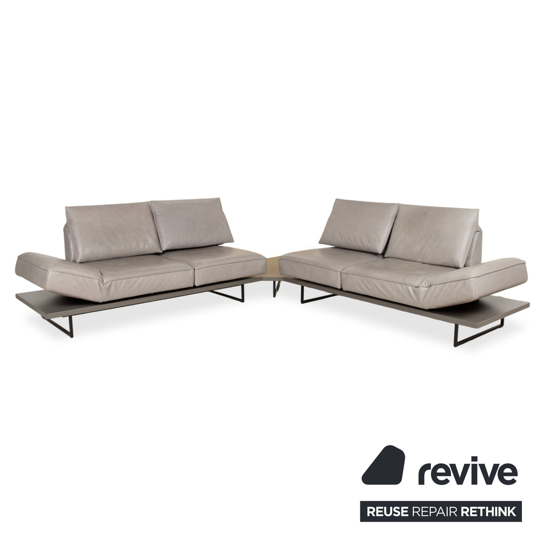 Canapé d'angle en cuir Koinor Phoenix gris taupe grège avec fonction manuelle