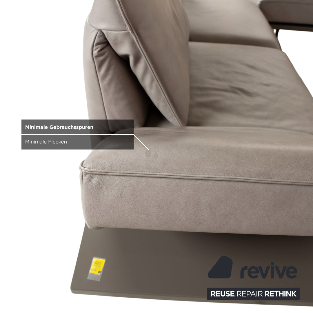 Canapé d'angle en cuir Koinor Phoenix gris taupe grège avec fonction manuelle