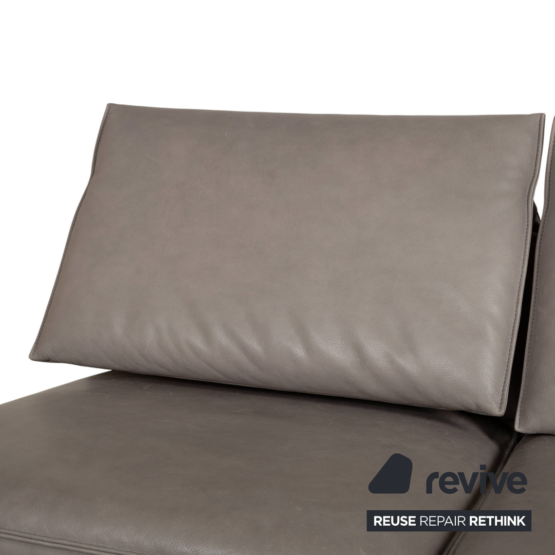 Canapé d'angle en cuir Koinor Phoenix gris taupe grège avec fonction manuelle