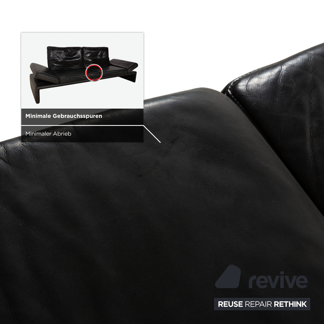 Canapé quatre places Koinor Raoul en cuir gris foncé anthracite et noir, à réglage manuel