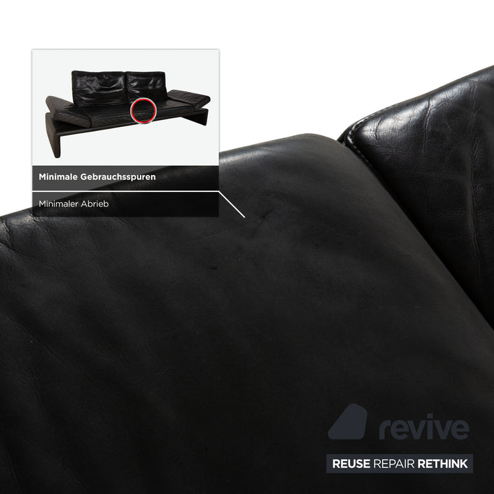 Canapé quatre places Koinor Raoul en cuir gris foncé anthracite et noir, à réglage manuel