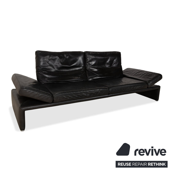 Canapé quatre places Koinor Raoul en cuir gris foncé anthracite et noir, à réglage manuel