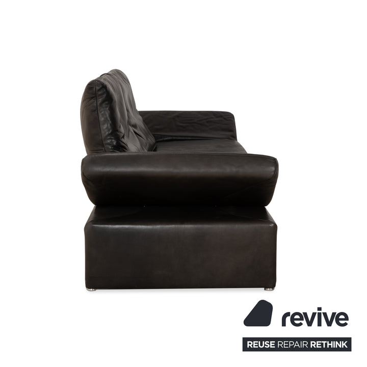 Canapé quatre places Koinor Raoul en cuir gris foncé anthracite et noir, à réglage manuel