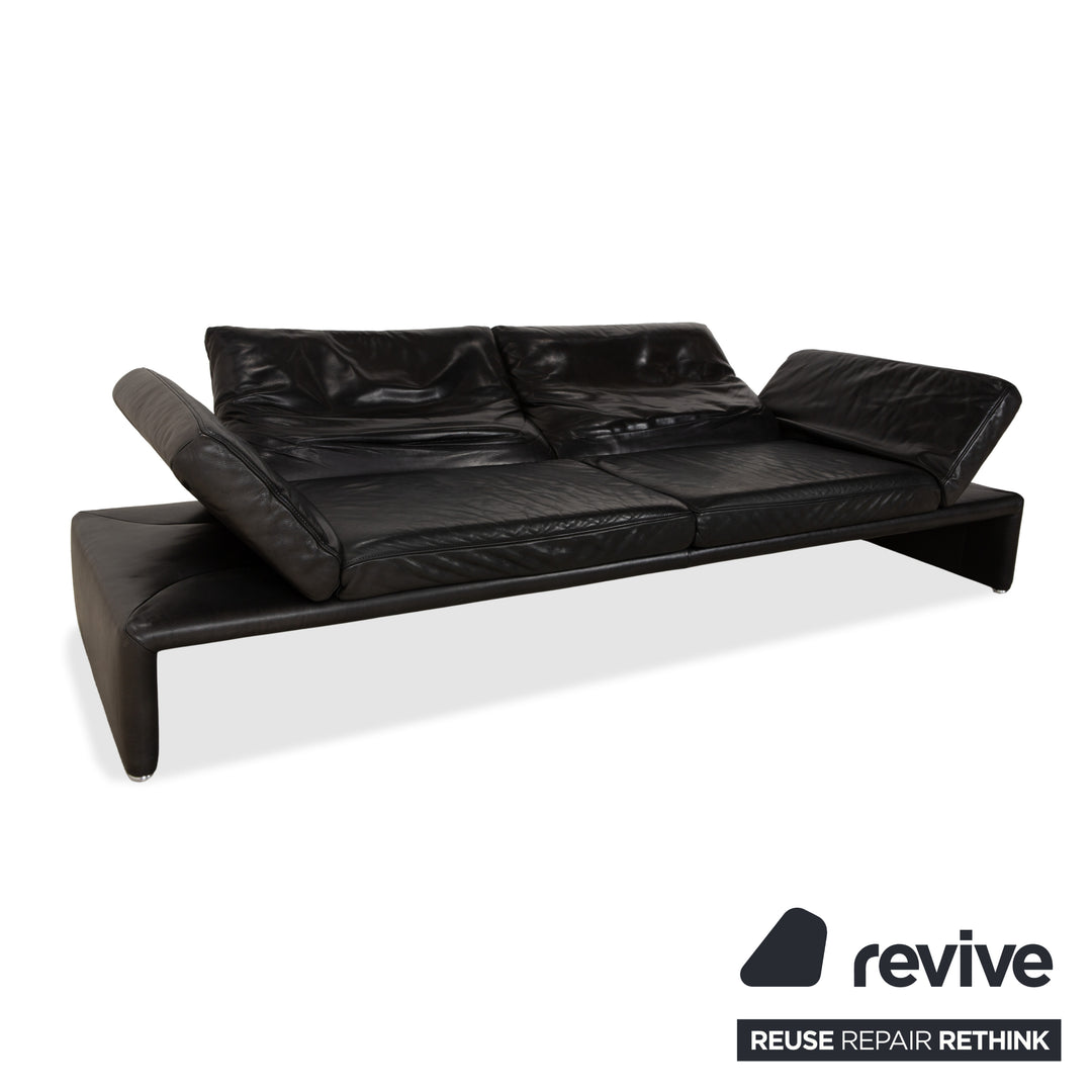 Canapé quatre places Koinor Raoul en cuir gris foncé anthracite et noir, à réglage manuel