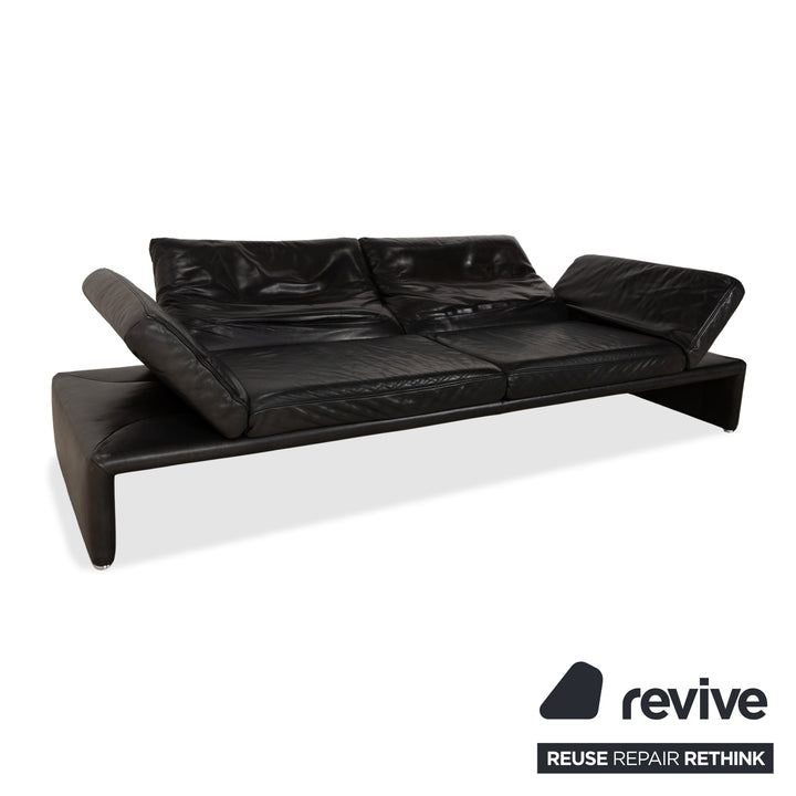 Canapé quatre places Koinor Raoul en cuir gris foncé anthracite et noir, à réglage manuel